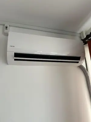 a white appliance sitting inside of a refrigerator at Yellowhouse Room 4 in Istanbul