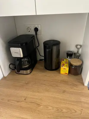 a corner of a kitchen with a coffee maker at Yellowhouse Room 1 in Istanbul