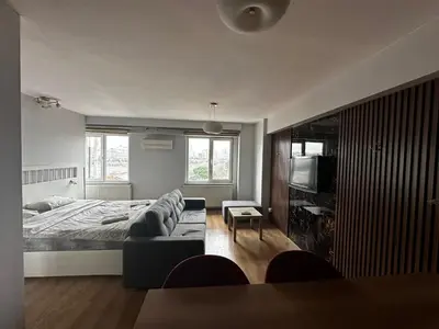 a living room with a bed and a couch at D&D Pansiyon in Istanbul