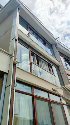 a building with windows on the side of it at Bude Ortaköy in Istanbul