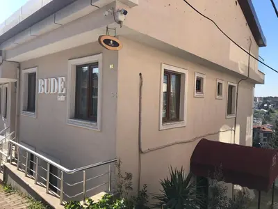 a building with a sign on the side of it at Bude Ortaköy in Istanbul