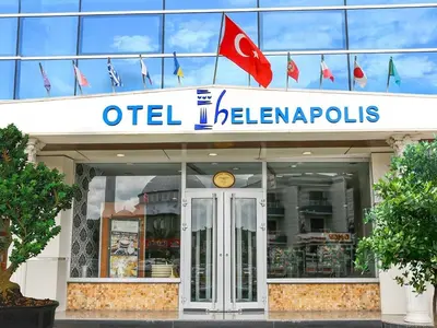a sign on the front of an old heinemannalls store at Helenapolis OTEL in Yalova