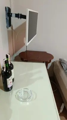 a counter with two bottles of wine on it at Simge in Istanbul