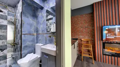 a bathroom with a toilet and a sink at Wonder House Sultanahmet in Istanbul