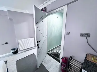 a bathroom with a shower with a glass door at Bro Apartments Sultanahmet in Istanbul