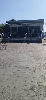 a building with people standing in front of it at Yellow Bull Istanbul hotel in Istanbul