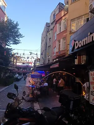 a group of motorcycles parked on a city street at Yellow Bull Istanbul hotel in Istanbul