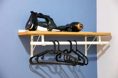 a wooden shelf with a wine bottle and glasses on it at Beans House Suite 8-26 in Istanbul