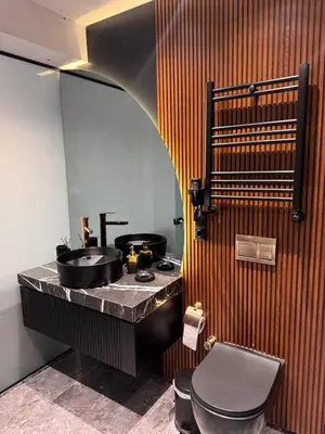 a bathroom with a sink and a toilet at Zeytin Hotel in Istanbul