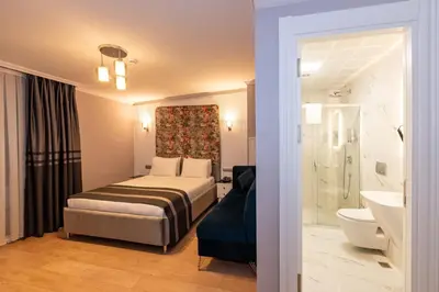a hotel room with a bed and a bathroom at The Now Hotel in Istanbul