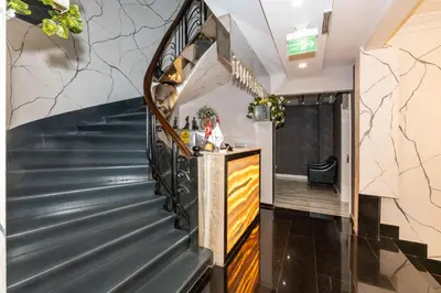 a staircase in a building with a bar at The Now Hotel in Istanbul
