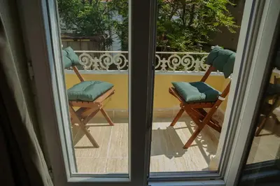 a view of two chairs from a window at BOHO HOUSE Istanbul in Istanbul