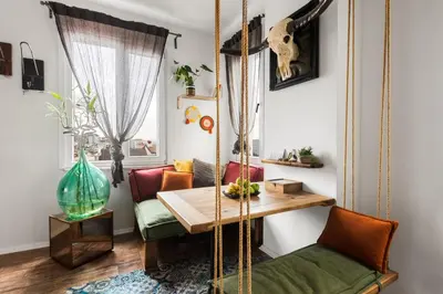 a living room with a couch and a table at Panoramic Sea View Loft with Terrace BBQ in Istanbul