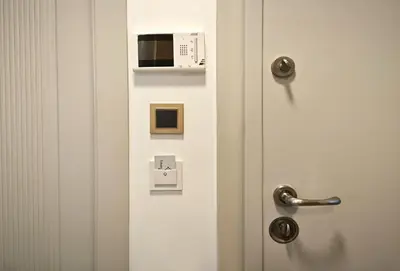 a door with a microwave on top of it at Marmada Suites in Istanbul