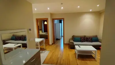 a living room with a couch and a table at Luxury Residence in Taksim in Istanbul