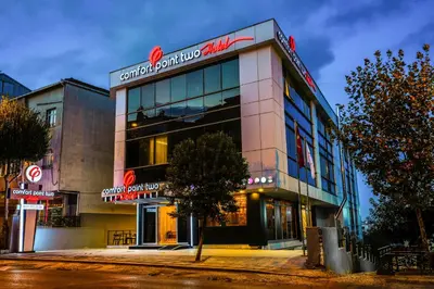a building with a sign on the side of it at Comfort Point Two Hotel in Istanbul