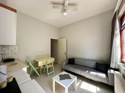 a living room with a couch and a table at Triplex in Taksim Square with 4 Bedroom in Istanbul