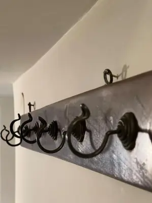 a metal fixture hanging on a wall at Konak Maksem in Bursa