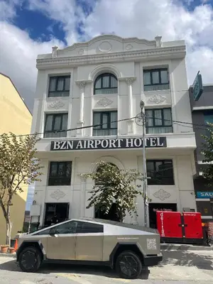 a car parked in front of a building at BZN Airport Hotel in Arnavutköy