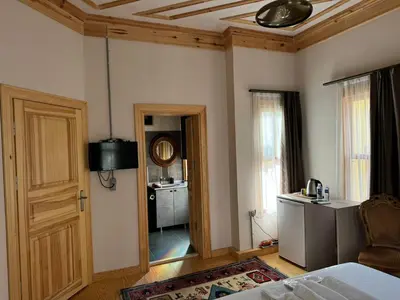 a room with a bedroom with a bed and a door at HanFlats in Istanbul