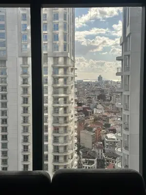 a view of a city from a window at Sinpaş Queen Bomonti Residence by Bondy in Istanbul