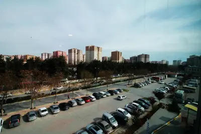 a parking lot full of cars in a city at Sarissa Hotel in Istanbul