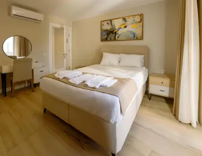 a bedroom with a bed with two towels on it at Sense Suite Residence-15 in Istanbul