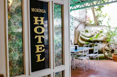 a sign on the door of a restaurant at Green Moringa Termal Hotel in Termal