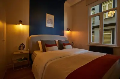 a bedroom with a large bed and a window at Stunning 3BR 2Bath AC in Center - Santur D3 in Istanbul