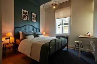 a bedroom with a large bed and a window at Charming 3BR 2Bath AC in Center - Santur D7 in Istanbul