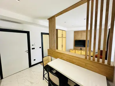 a kitchen and dining room with a table and chairs at Rose Point Residence in Istanbul