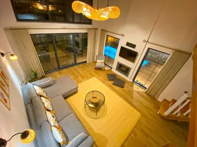 a living room with a couch and a table at Sapanca İnci Suit in Yanık