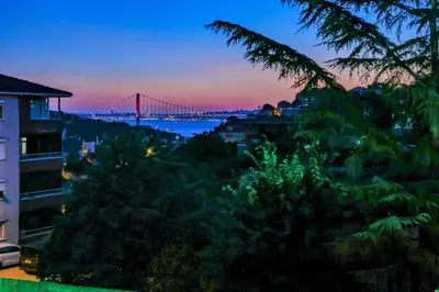 a view of the golden gate bridge at dusk at Boğaz Manzaralı Havuzlu Lüks Villa in Istanbul