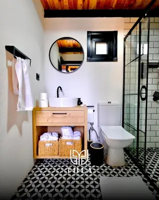 a bathroom with a sink and a toilet at THEA Sapanca Bungalov in Dilekli