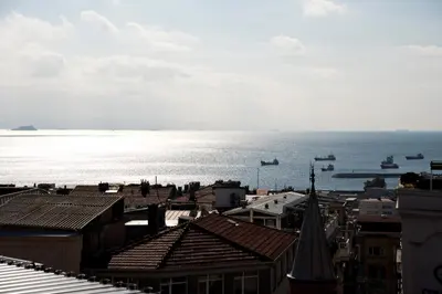 a view of the ocean from the roofs of buildings at XLoft in Istanbul