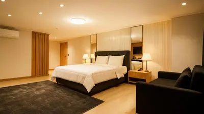 a hotel room with a bed and a couch at XLoft in Istanbul