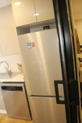 a stainless steel refrigerator in a kitchen at Lovely One Bedroom Appartment-530 in Istanbul