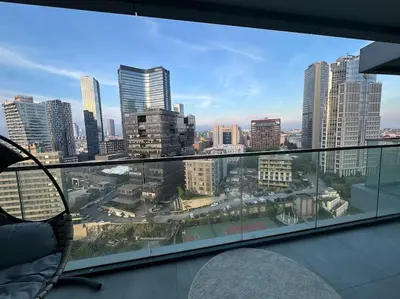 a view of a city skyline from a balcony at Cozy luxury apt in Sinpas queen in Istanbul