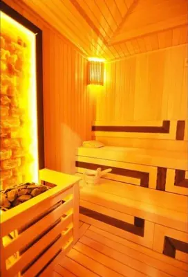a room with a sauna with a bench and a window at Elegant 2 bedroom apt Sinpas queen gym pools in Istanbul