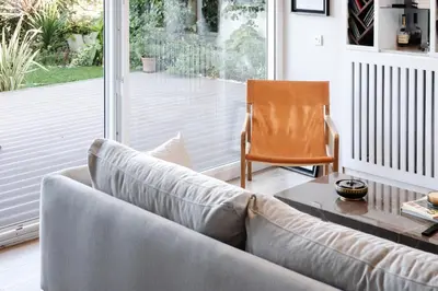 a living room with a couch and a table at Bosphorus Designer Suite Seperate Guest room in Istanbul