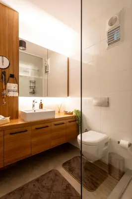 a bathroom with a toilet and a sink and a mirror at Bosphorus Designer Suite Seperate Guest room in Istanbul