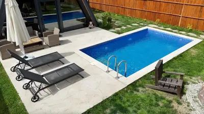 an overhead view of a swimming pool with a table and chairs at Bonte Sapanca in Feyziye