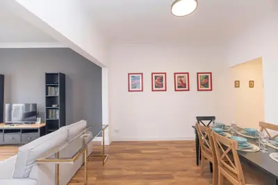 a dining room with a table and chairs at Trendy Waterfront Apt with a Striking View in Istanbul