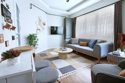a living room with a couch and chairs at Excellent Apartments Fatih Legacy in Istanbul
