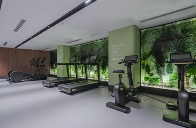 a gym with treadmills and elliptical machines at Romatem Move İstanbul Disabled Hotel in Istanbul