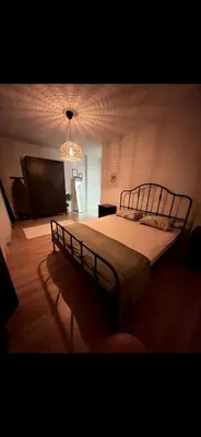 a bedroom with a large bed in a room at KÖYLÜM RESİDENCE-2 Bostancı in Istanbul