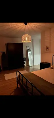 a room with a bed and a projection screen at KÖYLÜM RESİDENCE-2 Bostancı in Istanbul