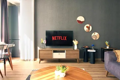 a living room with a television on a table at Excellent Apartments Fatih Golden Horn in Istanbul