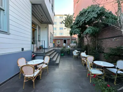 a row of tables and chairs on a patio at Va Mansion in Istanbul