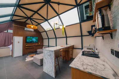 a room with a kitchen and a living room at BALİ Sapanca in Sakarya